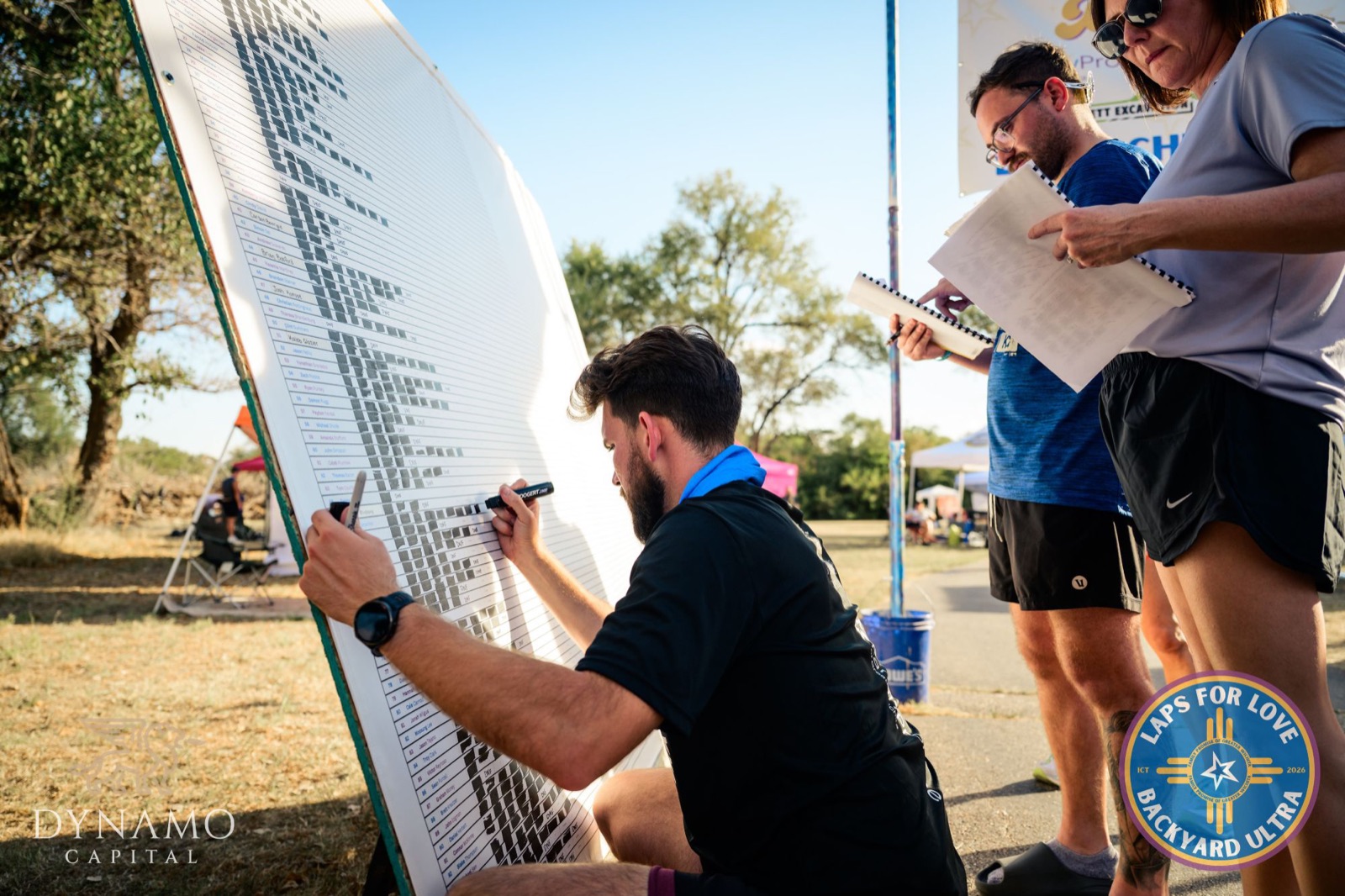 Volunteers marking laps on the lap board